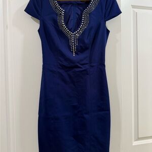 Elegant Navy Blue Dress with Embellished Neckline